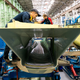 Illustration for article titled These Riveting Photos Show How Russias Su-34 Fullback Fighter-Bombers Get Built